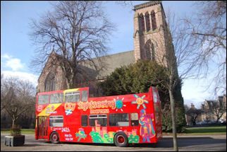 CitySightseeing bus at Inverness cathedral